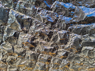 Mosaic-shaped stone wall.