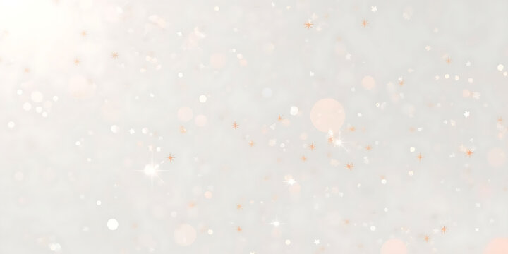 The image features a dreamy, delicate, and lightly dispersed magical effect, with a minimal white background scattered with small orange sparkles and soft light particles.