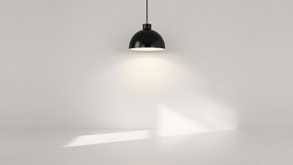 A single black pendant lamp hangs from the ceiling, casting a bright, focused light on a white wall and floor, creating a stark contrast and shadow.