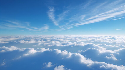 Fototapeta premium A clear blue sky with light, wispy cirrus clouds provides a serene and peaceful backdrop for a concept of freedom or tranquility.