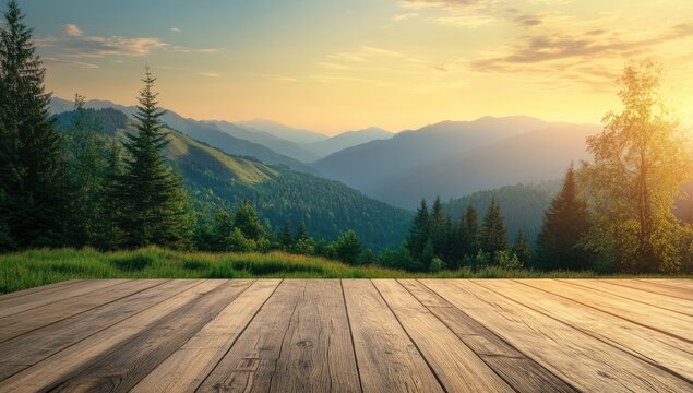 Wooden deck overlooking a mountain range at sunset. Lush green forests and peaks fade into a hazy twilight sky