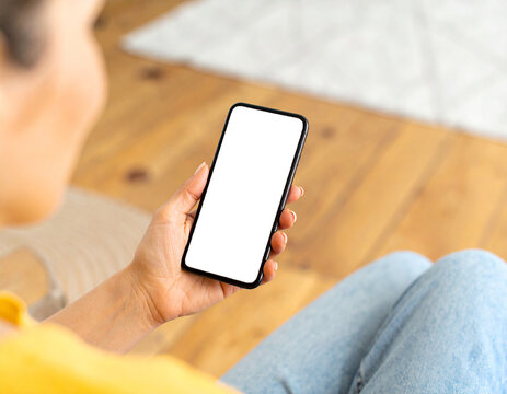 A person looking at their personal genomic data on a smartphone app. A concept for an empowered patient