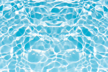 Blue water with ripples on the surface. Defocus blurred transparent blue colored clear calm water surface texture with splashes and bubbles. Water waves with shining pattern texture background.