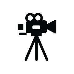 Obraz premium Classic vintage film camera icon on a tripod for filmmaking and video production