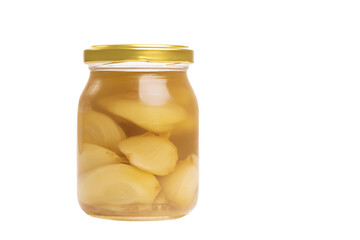 a jar of pickled onions on a white surface