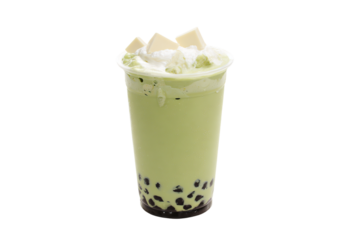 a green drink with a white chocolate topping