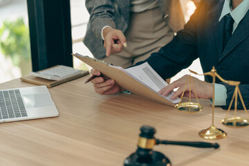 Courtroom, legal counsel with gavel and law. Justice and lawyer concept. Judge's gavel on table, close up.