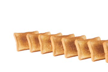a row of toasted bread sitting on top of a white surface