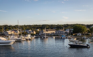Fototapeta premium Harbor with Boats and Coastal Buildings