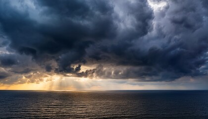 storm clouds darkening horizon sunlight piercing dramatic overcast sky generating moody atmospheric tension and impending weather drama