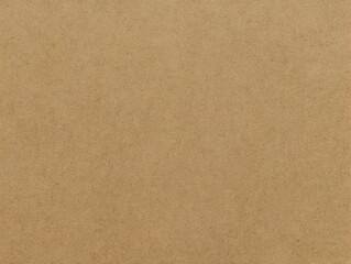 Kraft paper texture plain background with soft granular detail providing a neutral surface for packaging and print templates