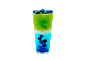 a blue and green drink with blueberries in it