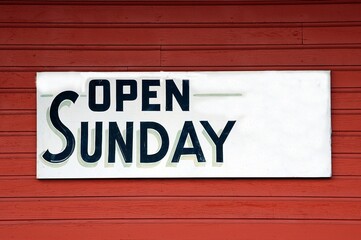 Open Sunday Sign at store front