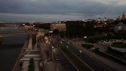 Fototapeta premium View of Warsaw from a drone. The drone flies over the river, offering a view of the royal castle