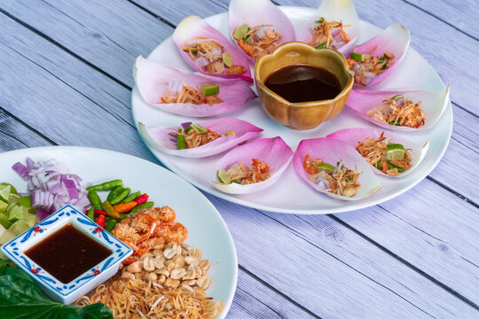 Mieng kham is a traditional snack from Thailand and Laos. The name "miang kham"
