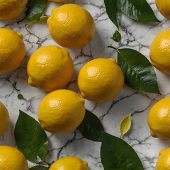 Fresh lemons with green leaves on white marble background