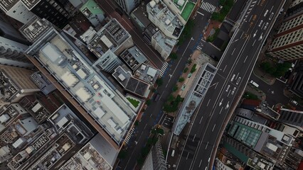 Fototapeta premium Top view of the roofs of houses on a city street. Dense urban development in Tokyo, Japan