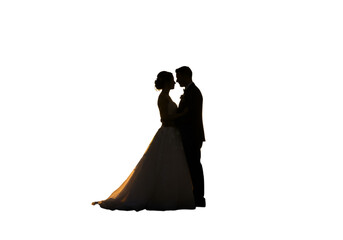 Elegant Wedding Photo of Silhouetted Couple in Evening Embrace