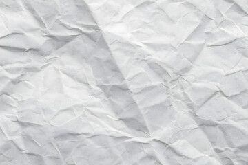 Fototapeta premium Abstract white crumpled paper texture creates a clean, modern and artistic background for your design projects