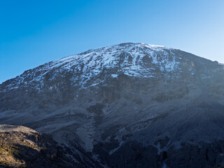Majestic mount kilimanjaro snow-capped peak in tanzania.