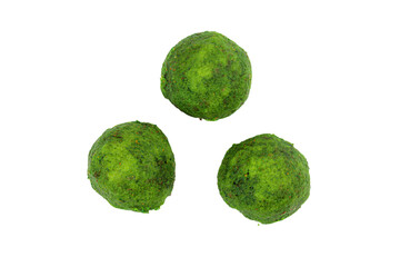 three green balls of broccoli on a white surface