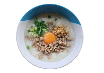 Homemade creamy whole grain oatmeal served in a hot bowl with fresh apples and cranberries