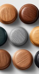 Assorted round decorative objects with wood grain finishes in various colors.