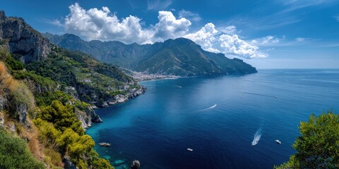 Obraz premium Coastal scenery with dramatic mountains and azure water