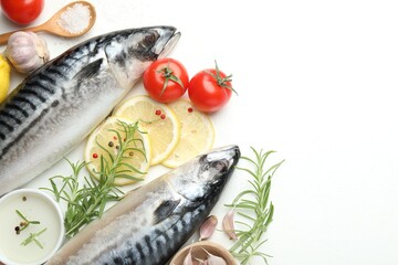 Seafood delicacies. Fresh raw mackerels and spices on white table, flat lay. Space for text