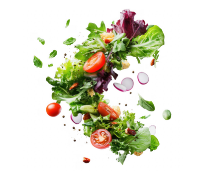 Freshly tossed salad ingredients floating against a dramatic transparent background