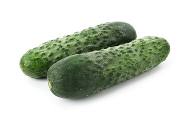 Two fresh green cucumbers isolated on white