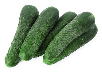 Many fresh green cucumbers isolated on white, top view