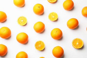 Fresh ripe oranges on white background, flat lay