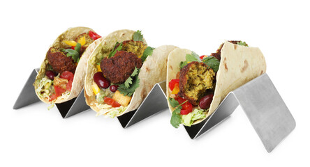 Tasty vegetarian tacos with falafel, tofu, beans and vegetables isolated on white