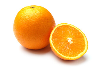 Whole and cut oranges isolated on white
