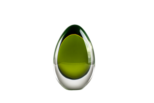 a green and silver vase with a white background