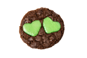 a cookie with two green hearts on it