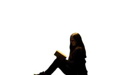 Isolated Photo Of A Young Woman Reading A Book In A Dark Environment