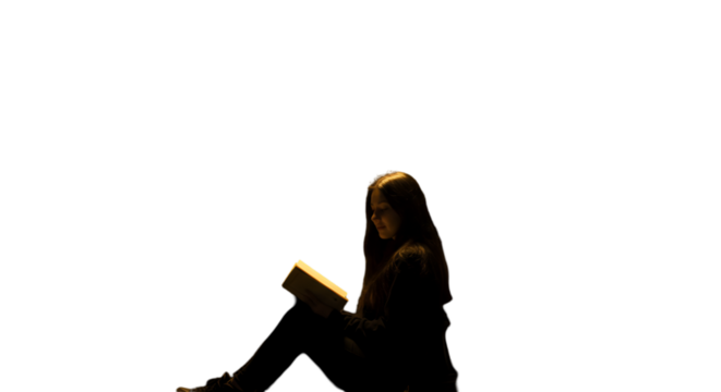 Isolated Photo Of A Young Woman Reading A Book In A Dark Environment