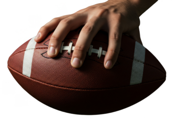 Photo of Hand Gripping Football on Black Background