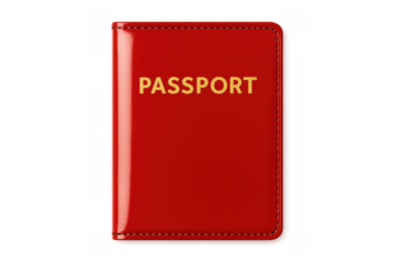 Red passport displaying golden text, symbolizing global mobility and personal identification against clean backdrop