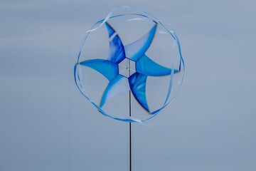 blue spinning windmill kite Portsmouth International Kite Festival July 2025