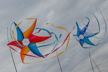 spinning windmill kites Portsmouth International Kite Festival July 2025