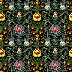Folk art seamless pattern with flowers and patterned plants
