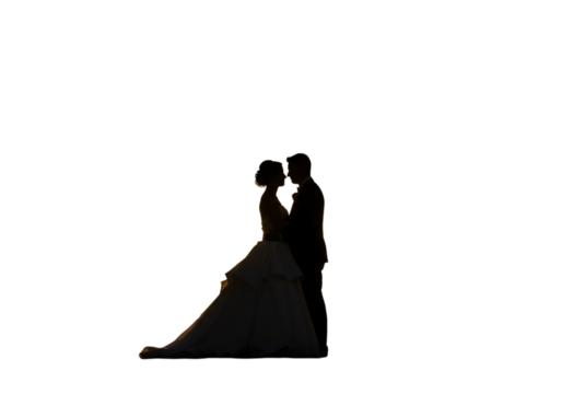 Romantic Silhouette Wedding Photo Of Couple Embracing In Evening Light