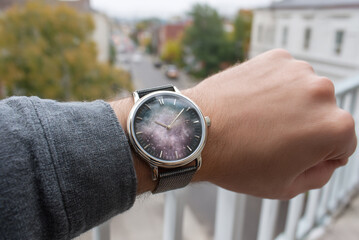 Naklejka premium Wristwatch or phone displaying warped time after exposure to unknown energy field. 