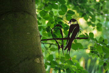 Pair of metal swallows at Bolam Lake, which is a country park in Northumberland, England known for its scenic lake and woodland walks