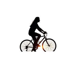 Fototapeta premium Silhouette Of Woman Riding Bike In Orange Light During The Night PNG