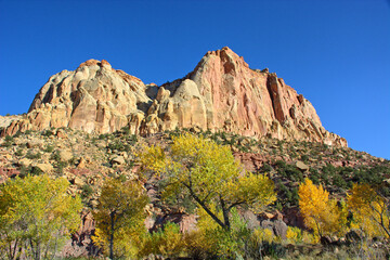 Towering Sandstone Cliffs in Capitol Reef National Park, Utah Desert