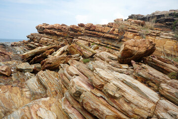 A large natural pile of quartzite stones arranged parallel to each other at Khao Laem Ya-Mu Ko...